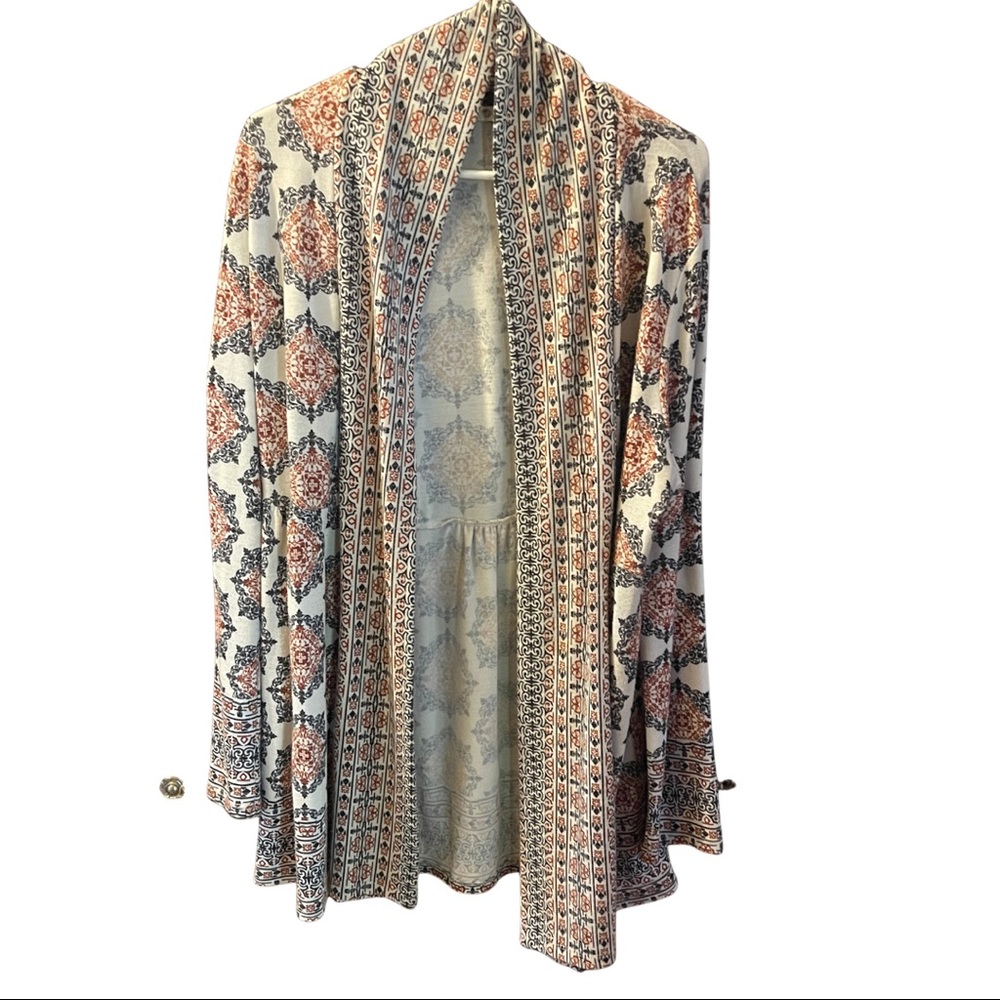 Cream sweater with blue and orange detail